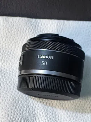 عدسه كانون 50 RF جديده باكو ملوح