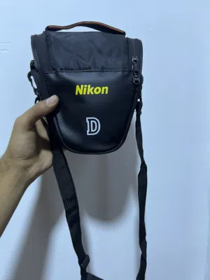 كامره كانون نوع نيكون D5000 كامل ملحقاته