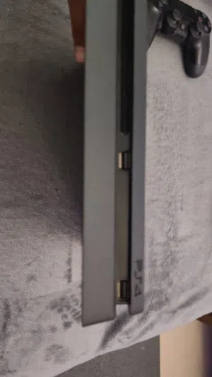 Ps4/silm (850)   واستعامل شهر مع يدتين و شريطين قابل لي تفاوض
