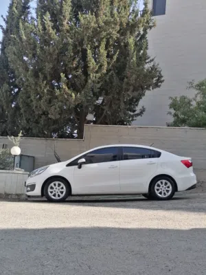 كيا برايد 2017 /بنزين / ماتور 1400 / فحص نخب / دهان شركه/ اصل كوري