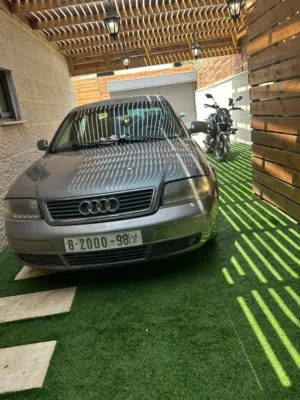 audi-a6-مطور-1800-تيربو-موديل-1998-السياره-شغاله-ميه-بلميه-تخلو-من-الضربات-مكسور-عليها-وصل-واحد