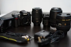Nikon d7000 full gear body + 4 lenses + flash + bag ( exellent condition )