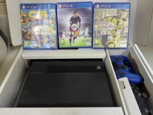 PlayStation 4 Package – Console + 2 Controllers + 3 Games