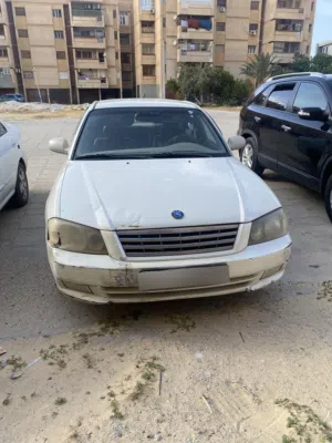 كيا اوبتيما2003
