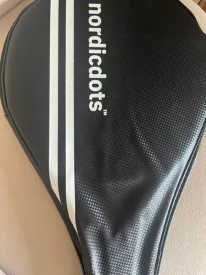 Padel racket with cover