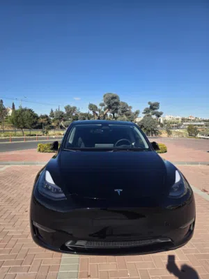 Tesla Model Y Long Range Dual Motor 2024 سيارة مميزه لون اسود-مسجلة بالوكالة-تأمين شامل-جرافين أصلي