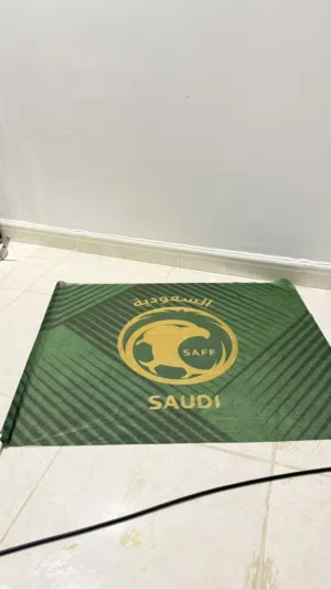 علم (شعار) المنتخب السعودي الصقر الذهبي (السعودية)