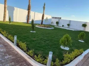 تنسيق حدائق وزراعة أشجار الزينة والأشجار المثمرة
