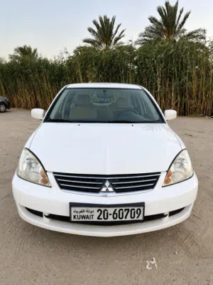 لانسر2013 ماكينة 1600 CC ( حالة نادرة ) ( شرط الفحص )