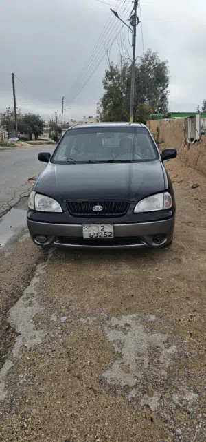 كيا كارينز موديل 99 سيارة عائلية 7 مقاعد قير اتوماتيك ماتور 18 فحصها خالي قص قلابان ماتور بيان جمركي
