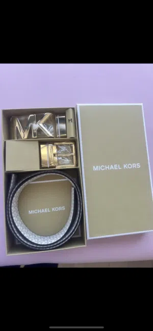 Brand new Michael Kors belt set with two interchangeable