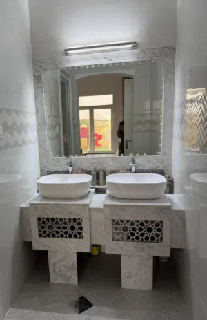 A clean, unused marble sink