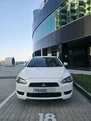 2015 Model Mitsubshi Lancer  Passing/ insurance upto Jan 2027