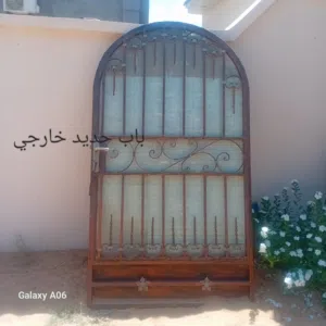 أبواب حديد ولوح وحديد مضلة بالقرميد