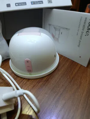 شفاط حليب كهربائي قابل للارتداء يعمل بشكل جيد مستعمل بحالة ممتازة استعمال خفيف جدا