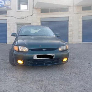 سيارة هيونداي اكسنت 1997 اتوماتيك هاتشباك لون زيتي