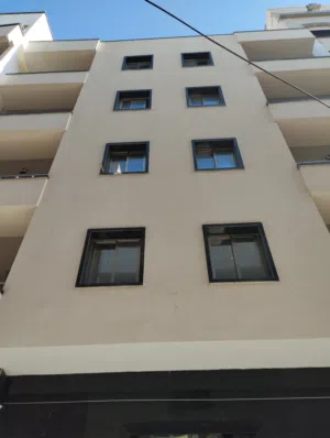 عمارة ممتازة بوسط المدينة طرابلس تشطيب حديث للبيع