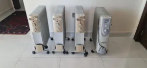 4 LARGE RADIATORS AS NEW.