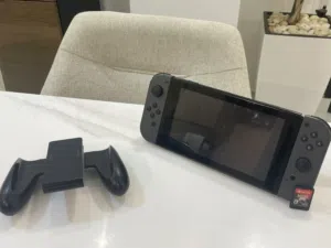 NINTENDO SWITCH BLACK with Pokémon shining pearl and accessories
