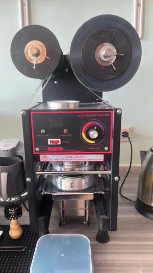 ماكينة تغليف كاسات نصف اوتوماتيك