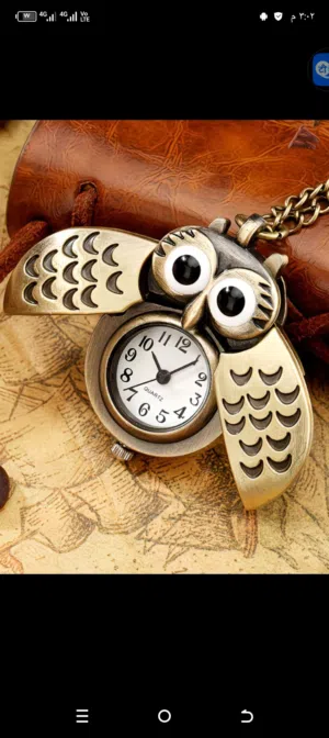ساعة جيب مظبوطة جدا بسلسلة كبيرة تنفع قلادة  مستعملة استعمال خفيف جدا  علي شكل بومة تفتح وتقفل