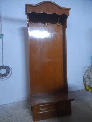 زاويه ملابس بيها خلال شويه تلكو بالصوره خشب عراقي صاج