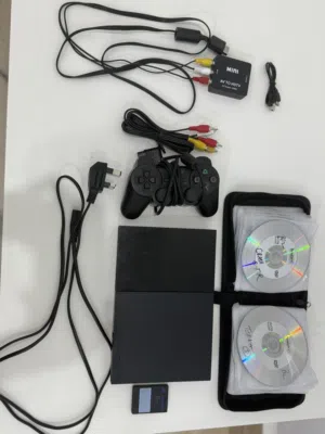 جهاز بلايستيشن 2 مستعمل مع يد تحكم و ميموري 8MB مع 34 شريط وحافظة أشرطة مع منفذ محول من AV الى hdmi