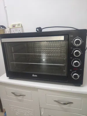 Electric oven  Ikonفرن اقتصادي