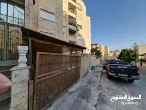 شقة أرضية في منطقة طبربور حي الخزنة للبيع