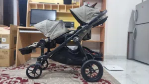 عربة اطفال توأم