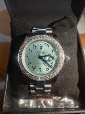 Rolex Day date Blue Arabic dial diamond bezel Automatic