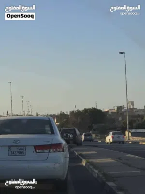 محلات مع ارض على رئيسي تاجوراء الوسط للبيع.. اقرأ الإعلان اكويس