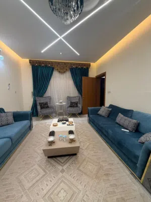 ديوان كامل مع ميز وتلفاز وبرده