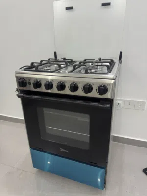 طباخ ماركة Mida اربع عيون60سم شغال نظيف جدا مستعمل شهرين فقط ناار عالية