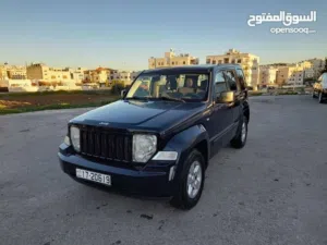 جيب شيروكي- ليبرتي  Sport لون كحلي تم شراءها من الشركة معروضة للبيع بداعي السفر وبحالة ممتازة
