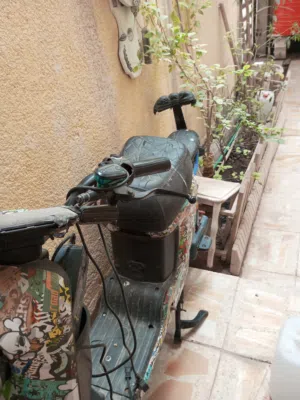 دراجه شحن بس بطاريات خربان