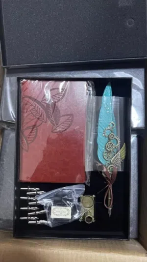 هدية قلم ريشة مع كتاب جلد