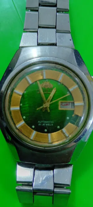 ساعة رجالي ماركة اورينت العالمية الياباني اتوماتيك مذهب