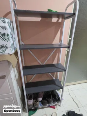 black and white shoe rack for keeping shoes