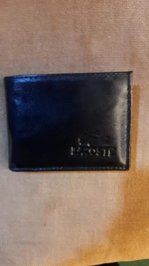 تشكيلة جديدة من محافظ وكراتات  أول براند مصرى بمواصفات المستورد  محفظة جلد طبيعى بقرى 100% المحفظة ب