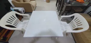 Plastic white table with chairs