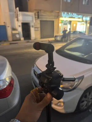 ترايبود كمرا وهاتف