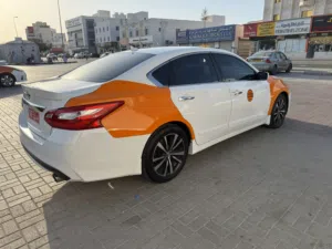 نيسان التيما 2017 بمحرك 2000 سي سي، مرخصة، حادث بسيط، أبيض، فحص وتقييم كامل