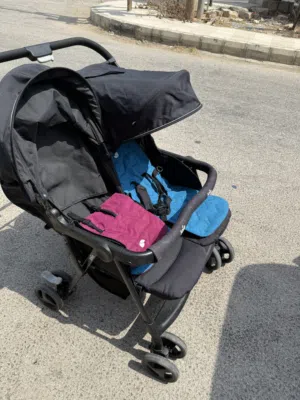 عرباي اطفال توأم ماركة جوي بحالة ممتازززززة