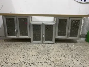 دولاب مطبخ ألمنيوم معلق حائطي بالاضائه فوق الوندينو مقاس 45*210