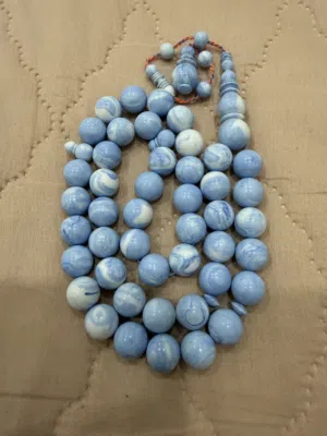 دومنه لون بيبي بلو 12 مللي 45 خرزه مطلوب 120 درهم