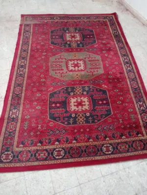 used and cleaned carpet . made in  turkey . 2 x 3 meter