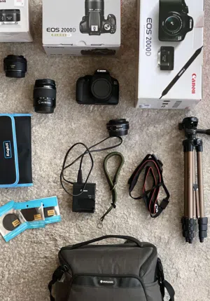 كاميرا كانون 2000D مع ملحقات اضافية نظيفة جداً accessories extra with 2000D camera Cannon "clean"