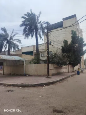 عقار للبيع البصره حي عمان بيت ركن مساحته 410 م2
