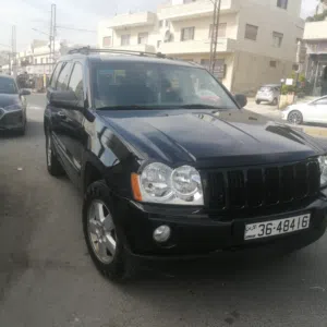 جيب شيروكي 2005 أسود لاريدو  4x4 وجلد